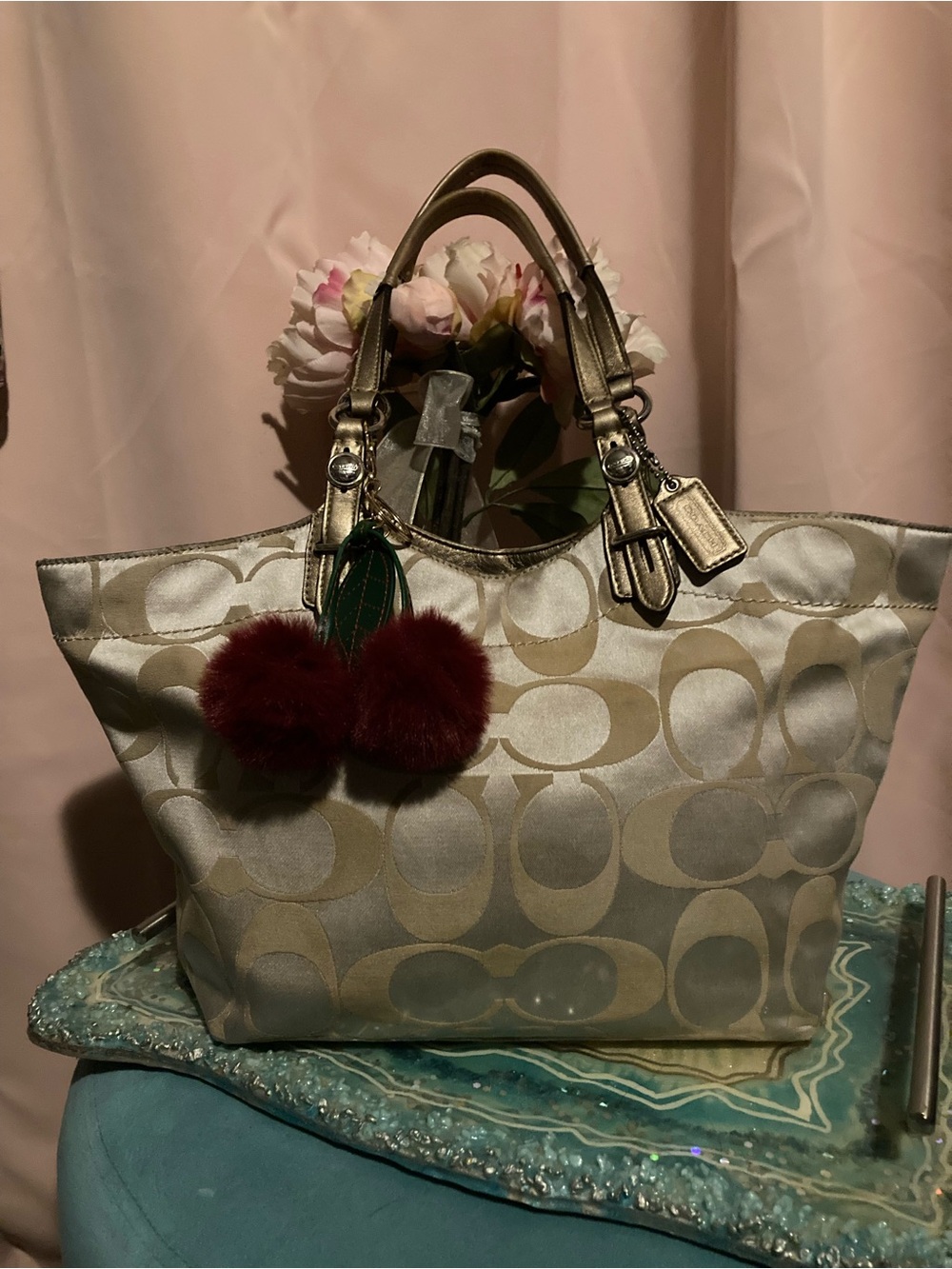 Coach Metallic Cream Signature Tote with Red Pom Charm